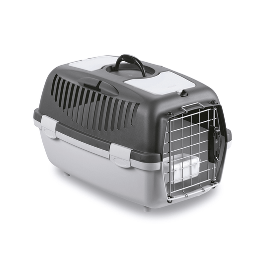 White background with a Krusse Stefanplast size 2 Travel Crate. The crate is light and dark grey plastic with a closed metal door.