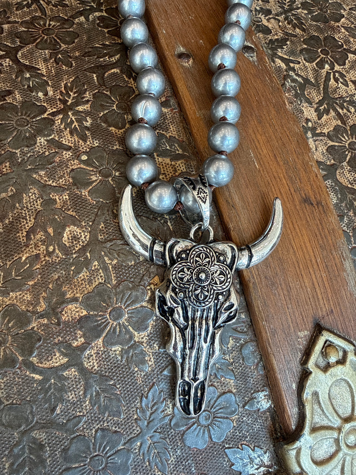 Long horn skull pendant necklace with silver-toned bull skull and turquoise bead chain