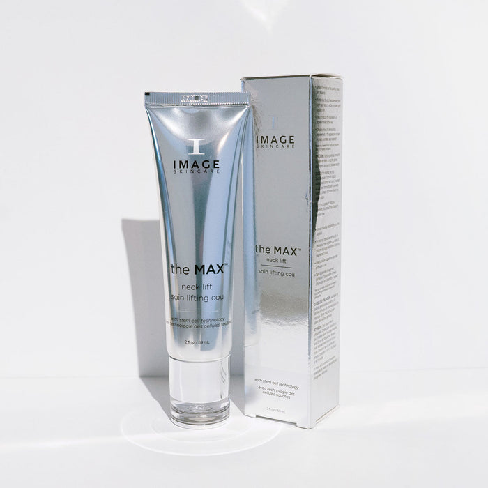 Tube and box packaging of MAX™ neck lift | IMAGE Skincare displayed against a white background, highlighting sleek silver design for skincare treatment.