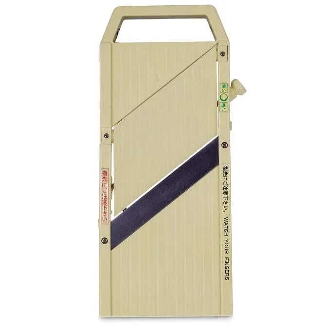 A professional quality mandolin slicer in green color with a silver blade strip, featuring a hand guard and adjustable thickness settings.