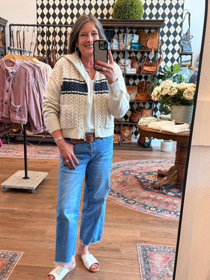 Women’s cable-knit varsity cardigan, taupe base with navy stripe bands and zip front