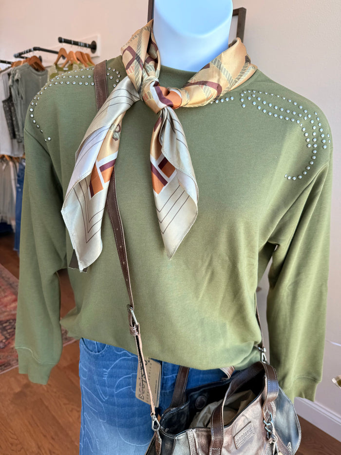 Olive sweatshirt with round silver studs on shoulders and crew neckline