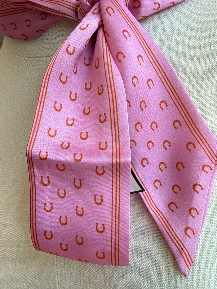 Pink twilly scarf with horseshoe pattern and border stripes, long ends