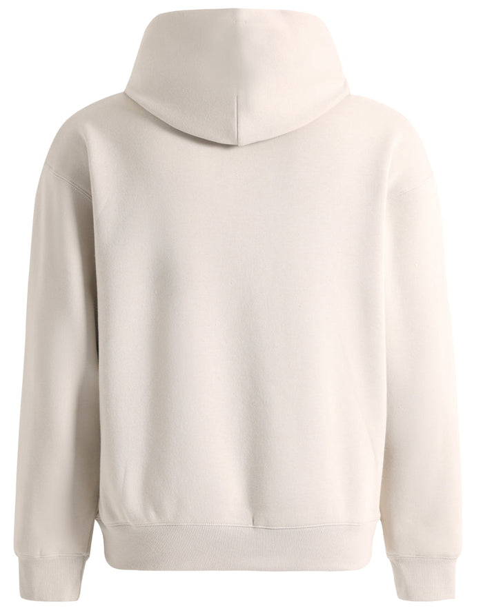 Premium oversized bone hoodie in cream color with soft textured fabric and ribbed cuffs perfect for workwear uniforms
