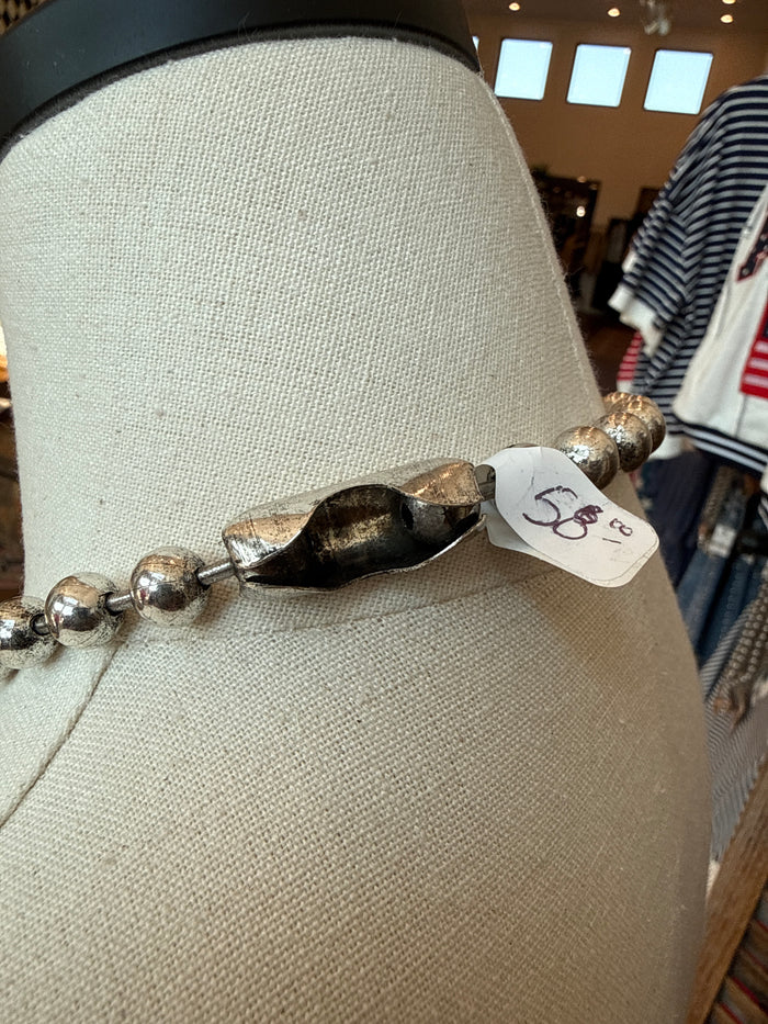 Silver-tone bead necklace featuring heart pendant with round bead links