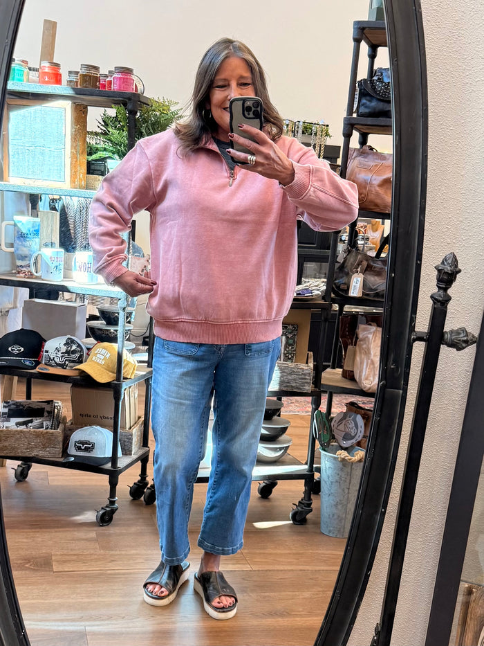 Pink mineral-washed quarter-zip sweatshirt with ribbed hem and cuffs