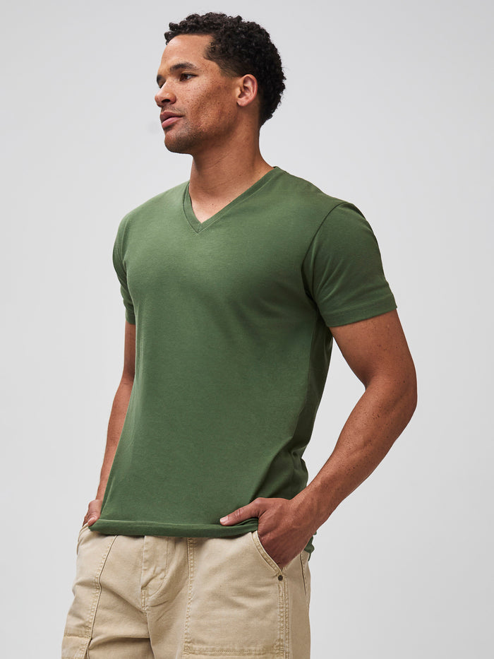 Mikah is 6'1" and wears a size medium # Sage V-Neck at Fresh Clean Threads | Fall 2025 Collection