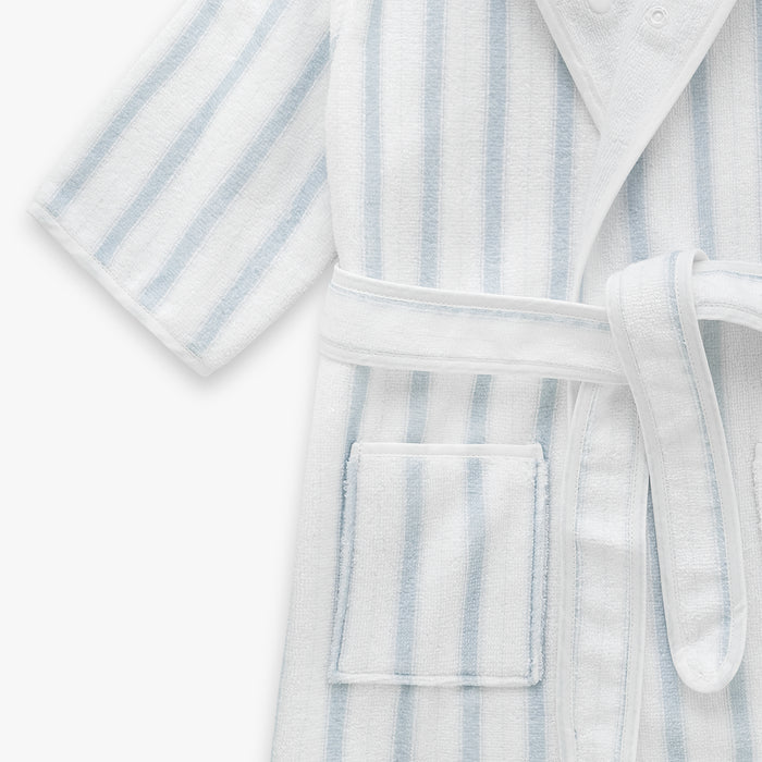 White bathrobe with blue stripes on a white background