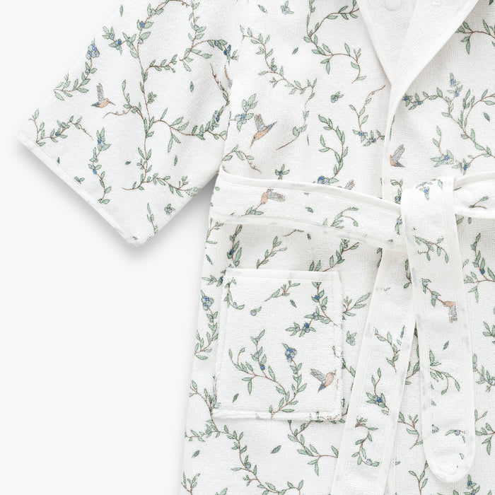 Floral-patterned bathrobe on a white background
