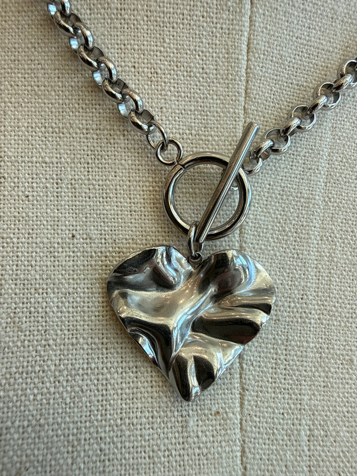 Silver hammered heart toggle clasp necklace pendant on curb chain
