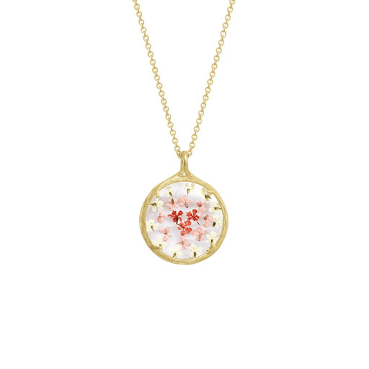 Small Ombre Botanical Necklace | Catherine Weitzman Jewelry features delicate pink and white flowers preserved in a round gold pendant on a fine gold chain.