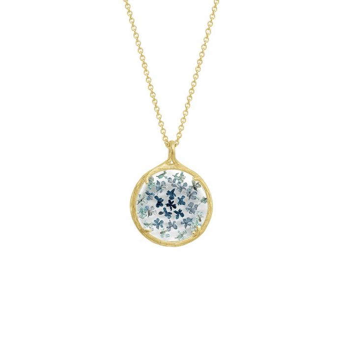 Small Ombre Botanical Necklace | Catherine Weitzman Jewelry featuring delicate blue and green ombre floral design encased in a round gold pendant on a fine gold chain.