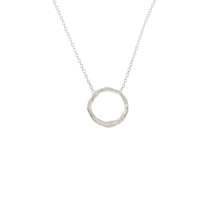Delicate silver circle pendant necklace with a textured organic design on a fine chain, featuring the Small Opihi Circle Necklace | Catherine Weitzman Jewelry.