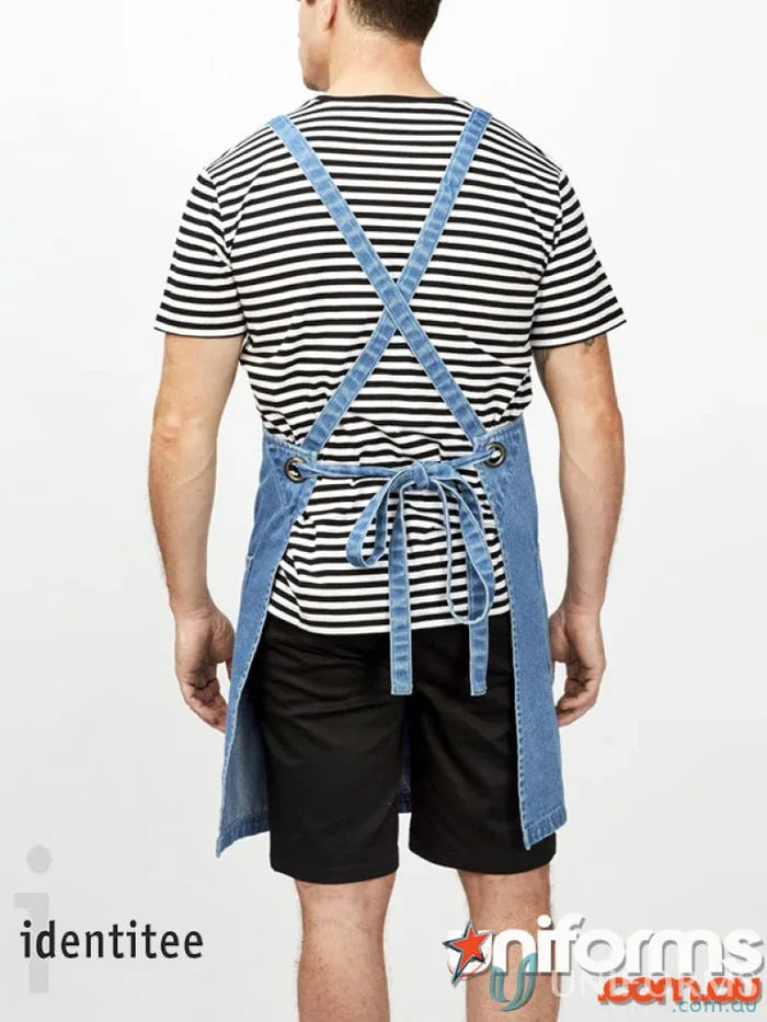 Person in black and white striped shirt wearing Stevie Stripe T-Shirt workwear white uniforms