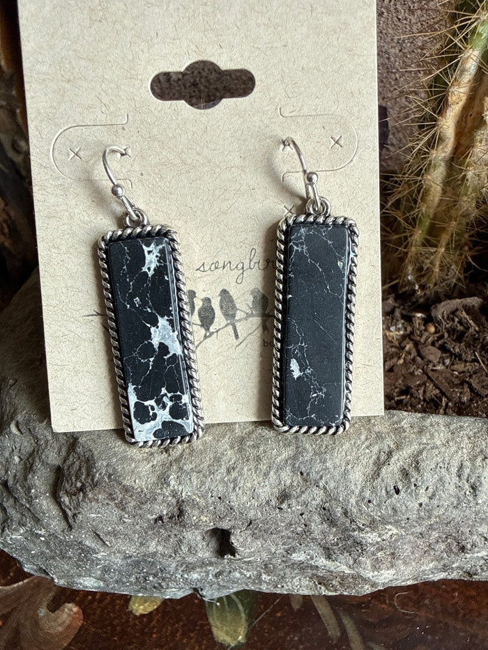 Stone fishhook earrings with rectangular black cabochons and silver-tone frames