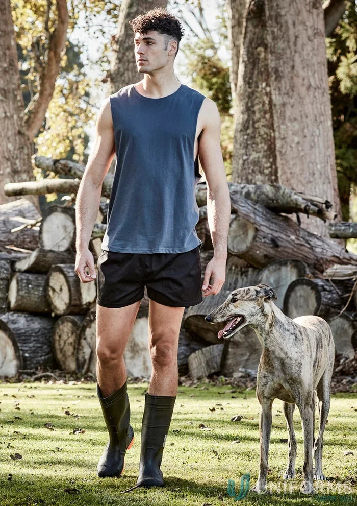 Man in tank top and boots with dog wearing Syzipik men’s rugby shorts zs105