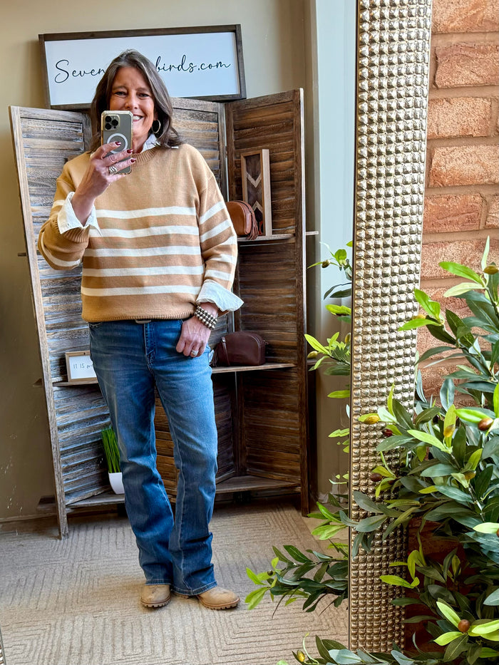 Tan striped crew neck sweater with cream bands, relaxed fit, long sleeves and ribbed hem