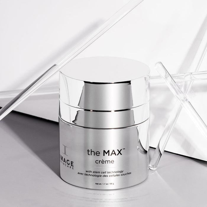 the MAX™ crème | IMAGE Skincare in a reflective silver container, showcasing advanced skincare technology with a clean, minimalistic background ideal for wellness and body care promotion