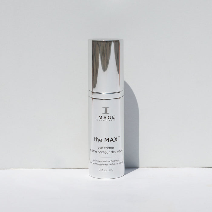 Bottle of the MAX™ eye crème | IMAGE Skincare with a sleek silver cap, standing upright against a light gray background, showcasing skincare product for eye care.