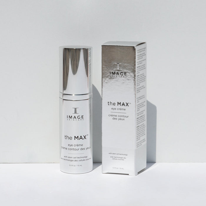 the MAX™ eye crème | IMAGE Skincare bottle and box displayed on a white surface, showcasing skincare product designed for eye contour care with stem cell technology and wellness benefits