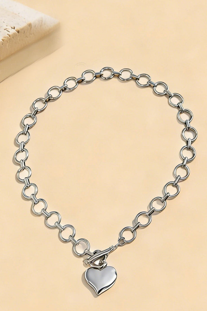 Silver heart toggle necklace with oval link chain and heart charm pendant
