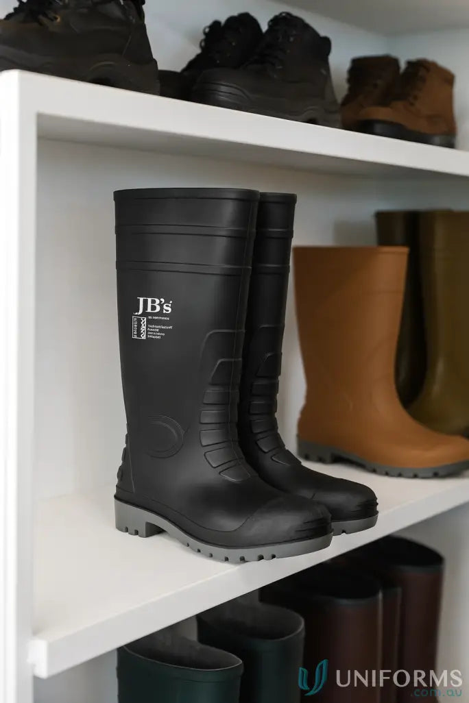 Black knee-high rubber boots with grey soles for food grade workwear or uniforms