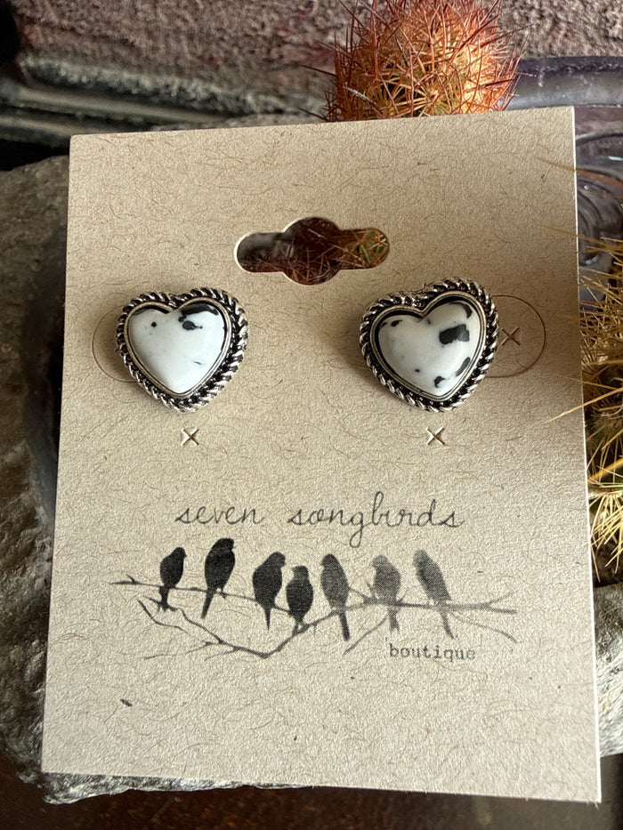 Heart stud earrings with white heart center and silver-tone heart frames, pair